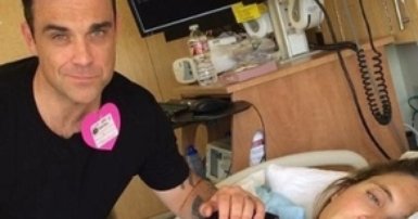 Robbie Williams blogs baby's birth